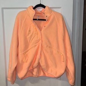 Free people movement fleece bright peach color
